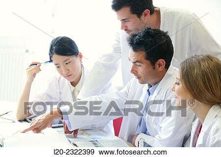 Stock Photo - Researchers in meeting room. Technological Services to Industry. Tecnalia Research & Innovation, Donostia, San Sebastian, Gipuzkoa, Basque Country, Spain.. Fotosearch