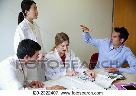 Stock Photo - Researchers in meeting room. Technological Services to Industry. Tecnalia Research & Innovation, Donostia, San Sebastian, Gipuzkoa, Basque Country, Spain.. Fotosearch