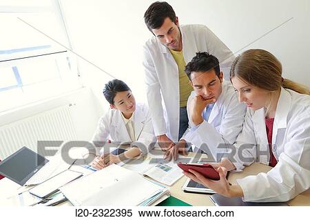 Stock Photography - Researchers in meeting room. Technological Services to Industry. Tecnalia Research & Innovation, Donostia, San Sebastian, Gipuzkoa, Basque Country, Spain.. Fotosearch