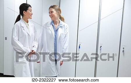 Researchers in the dressing room. White coats. Technological Services to Industry. Tecnalia Research & Innovation, Donostia, San Sebastian, Gipuzkoa, Basque Country, Spain. View Large Photo Image Stock Photo - Researchers in the dressing room. White coats. Technological Services to Industry. Tecnalia Research & Innovation, Donostia, San Sebastian, Gipuzkoa, Basque Country, Spain.. Fotosearch