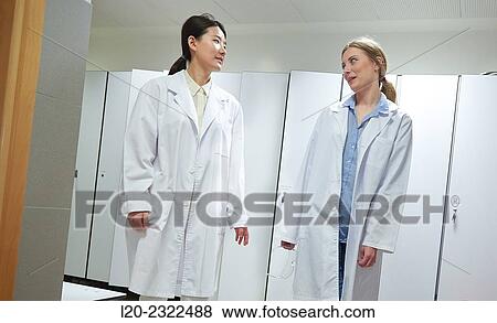 Researchers in the dressing room. White coats. Technological Services to Industry. Tecnalia Research & Innovation, Donostia, San Sebastian, Gipuzkoa, Basque Country, Spain. View Large Photo Image Stock Photo - Researchers in the dressing room. White coats. Technological Services to Industry. Tecnalia Research & Innovation, Donostia, San Sebastian, Gipuzkoa, Basque Country, Spain.. Fotosearch