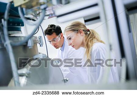 Stock Photo - Researchers. Vacuum chamber microwave plasma. Laboratory surfaces. Tecnalia Research and Innovation. Donostia. San Sebastian. Gipuzkoa. Basque Country. Spain. Fotosearch
