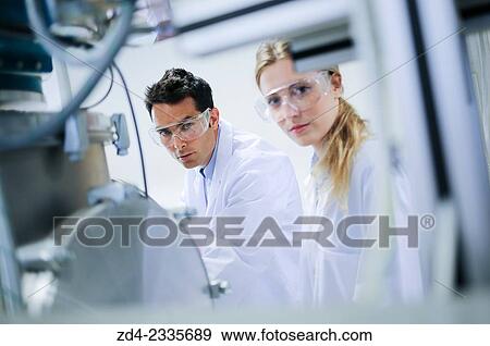 Stock Photo - Researchers. Vacuum chamber microwave plasma. Laboratory surfaces. Tecnalia Research and Innovation. Donostia. San Sebastian. Gipuzkoa. Basque Country. Spain. Fotosearch