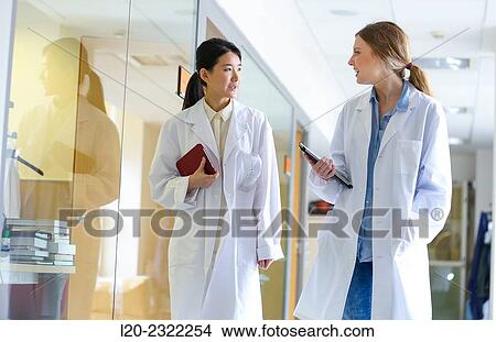 Researchers walking in hallway laboratory. Chemical Analysis Laboratory. Technological Services to Industry. Tecnalia Research & Innovation, Donostia, San Sebastian, Gipuzkoa, Basque Country, Spain. View Large Photo Image Picture - Researchers walking in hallway laboratory. Chemical Analysis Laboratory. Technological Services to Industry. Tecnalia Research & Innovation, Donostia, San Sebastian, Gipuzkoa, Basque Country, Spain.. Fotosearch
