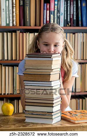 The girl with green apple and a book. View Large Photo Image Stock Image - The girl with green apple and a book.. Fotosearch