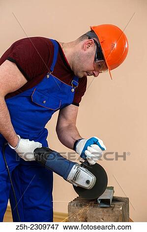 Stock Photo - The installer performs the order.. Fotosearch