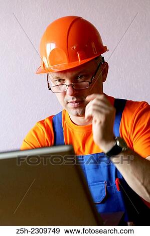 The man, the builder of residential homes. View Large Photo Image Stock Photo - The man, the builder of residential homes.. Fotosearch