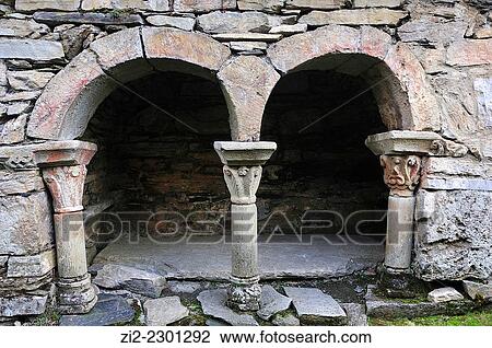 Stock Image - The Mozarabic church of Santiago, Xth century. Romanesque tomb. Penalba de Santiago, Leon, Spain. Fotosearch