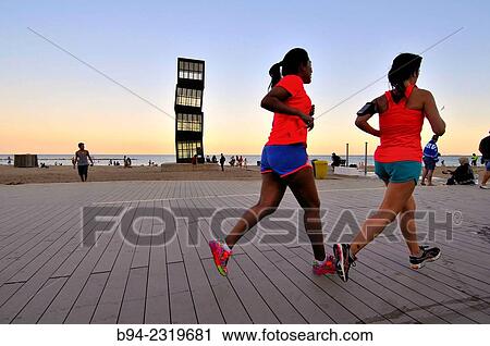 Urban athletes running. Sculpture L? estel ferit" ( The wounded star ) by Rebecca Horn at Barceloneta beach, 1992. Barcelona, Catalonia, Spain. " View Large Photo Image Stock Image - Urban athletes running. Sculpture L? estel ferit" ( The wounded star ) by Rebecca Horn at Barceloneta beach, 1992. Barcelona, Catalonia, Spain. ". Fotosearch