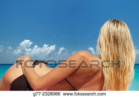 Usa. Florida. Miami Beach. Young woman on the beach. View Large Photo Image Stock Photograph - Usa. Florida. Miami Beach. Young woman on the beach.. Fotosearch