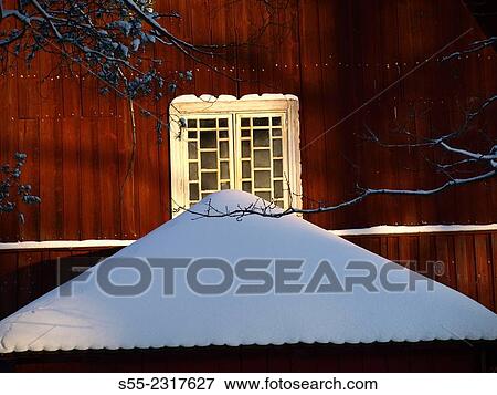 Window and little roof covered with snow. Lappeenranta, Finland. View Large Photo Image Stock Photo - Window and little roof covered with snow. Lappeenranta, Finland.. Fotosearch