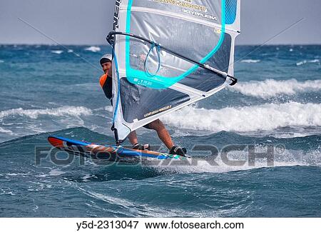 Stock Photo - windsurfing, Catania, Sicily, Italy. Fotosearch