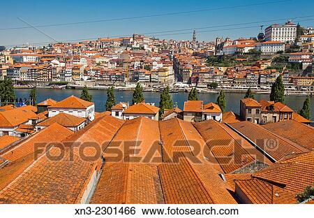Wineries Roofs, Vila Nova de Gaia, Douro river, on background Porto, Portugal, Europe. View Large Photo Image Stock Photograph - Wineries Roofs, Vila Nova de Gaia, Douro river, on background Porto, Portugal, Europe.. Fotosearch