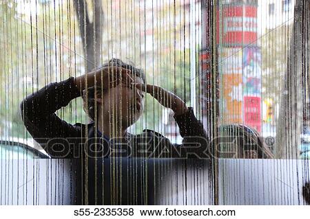 Young boy playing with his friend. Special effect, behind the curtains. Barcelona, Catalonia, Spain. View Large Photo Image Stock Photo - Young boy playing with his friend. Special effect, behind the curtains. Barcelona, Catalonia, Spain.. Fotosearch