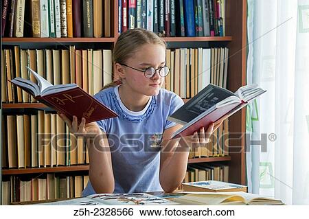Young girl reading fiction. View Large Photo Image Stock Photograph - Young girl reading fiction.. Fotosearch