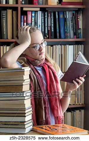 Young girl reading fiction. View Large Photo Image Stock Photography - Young girl reading fiction.. Fotosearch