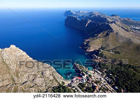 Stock Photo - Aerial view of Cala Sant Vicenc, whit its trhee calas, Barques, Molins, Carbo, and Formentosr at the botton, Mallorca, Balearic Island, Spain.. Fotosearch