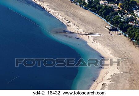 Aerial view of Pollenca beach in winter, Mallorca, Balearic Island, Spain. View Large Photo Image Stock Image - Aerial view of Pollenca beach in winter, Mallorca, Balearic Island, Spain.. Fotosearch
