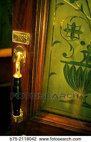 Ancient carved glass door of a pub with a shooter in the foreground and a sign with the word Push. London, England, UK, Europe. View Large Photo Image Stock Image - Ancient carved glass door of a pub with a shooter in the foreground and a sign with the word Push. London, England, UK, Europe.. Fotosearch