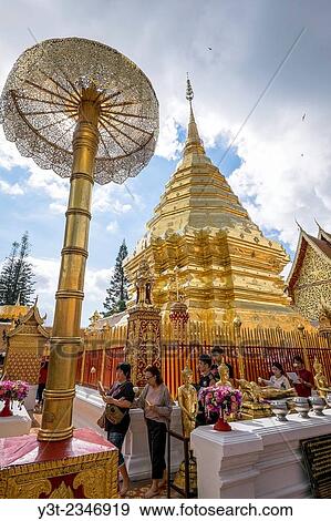 Asia. Thailand, Chiang Mai. Wat Doi Suthep. The faithful pray by going around the chedi. View Large Photo Image Stock Photo - Asia. Thailand, Chiang Mai. Wat Doi Suthep. The faithful pray by going around the chedi.. Fotosearch