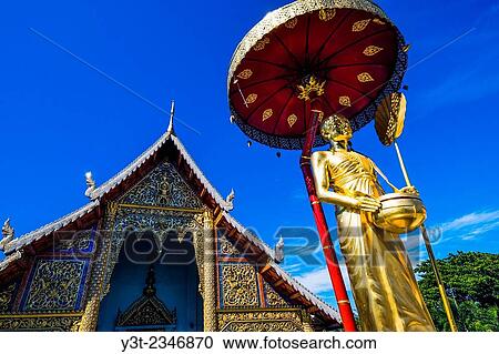 Asia. Thailand, Chiang Mai. Wat Phra Singh. Golden statue of a revered monk. View Large Photo Image Stock Image - Asia. Thailand, Chiang Mai. Wat Phra Singh. Golden statue of a revered monk.. Fotosearch