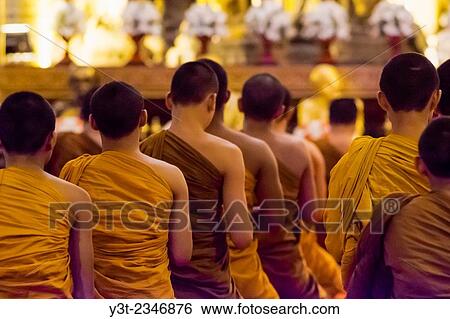 Asia. Thailand, Chiang Mai. Wat Phra Singh. Monks praying. View Large Photo Image Stock Photograph - Asia. Thailand, Chiang Mai. Wat Phra Singh. Monks praying.. Fotosearch
