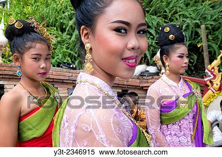 Asia. Thailand, Chiang Mai. Young Thai girls wearing traditional costume. View Large Photo Image Stock Photography - Asia. Thailand, Chiang Mai. Young Thai girls wearing traditional costume.. Fotosearch