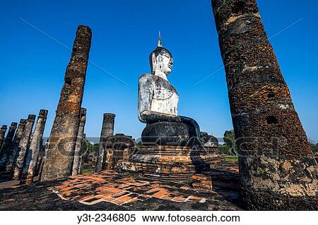 Asia. Thailand, old capital of Siam. Sukhothai archaeological Park, classified UNESCO World Heritage. Wat Mahatat. Buddha statue. View Large Photo Image Stock Photography - Asia. Thailand, old capital of Siam. Sukhothai archaeological Park, classified UNESCO World Heritage. Wat Mahatat. Buddha statue.. Fotosearch