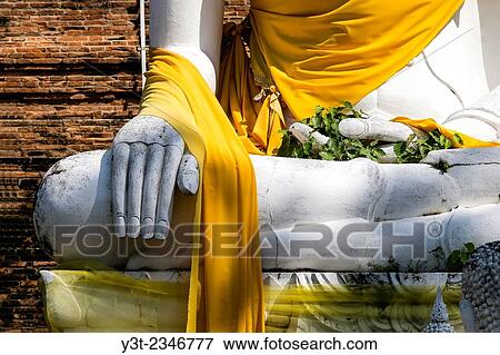 Stock Photo - Asia. Thailand, Phra Nakhon Si Ayutthaya. Ayutthaya (old capital of Siam), classified as a World UNESCO Heritage. Wat Yai Chai Mongkhon. Buddha statue. Detail.. Fotosearch