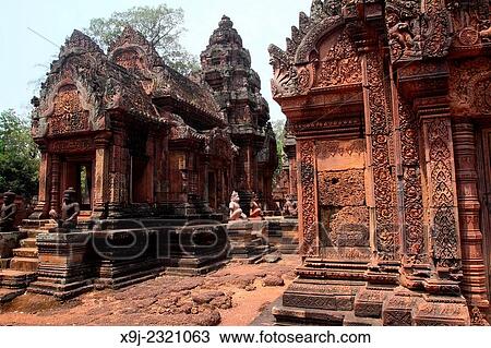 Banteay Srei temple, cntral courtyard with monkey and yaksha guardian figures, siem reap, cambodia. View Large Photo Image Stock Image - Banteay Srei temple, cntral courtyard with monkey and yaksha guardian figures, siem reap, cambodia.. Fotosearch