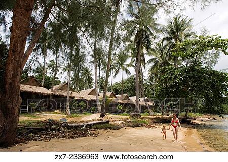 Beach on the island of Koh Russei. Koh Russei, also named Koh Russey or Bamboo Island is a green, gilt-edged crescent, resting on emerald or blue water. View Large Photo Image Stock Image - Beach on the island of Koh Russei. Koh Russei, also named Koh Russey or Bamboo Island is a green, gilt-edged crescent, resting on emerald or blue water.. Fotosearch