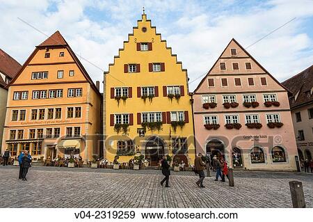 Beautiful timbered houses at the market square in Rothenburg ob der Tauber, Bavaria, Germany, Europe View Large Photo Image Stock Photo - Beautiful timbered houses at the market square in Rothenburg ob der Tauber, Bavaria, Germany, Europe. Fotosearch