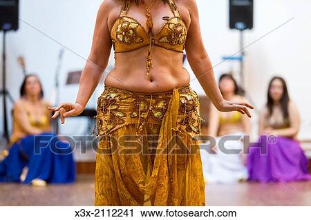 Belly dancing. View Large Photo Image Stock Image - Belly dancing.. Fotosearch