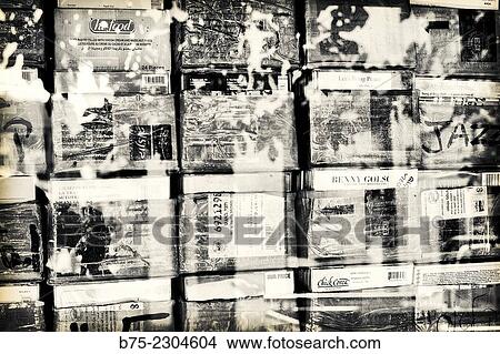 Picture - Boxes containing music CDs seen through the windowpane, Jazz, Chick Corea, Israel, Middle East. Fotosearch