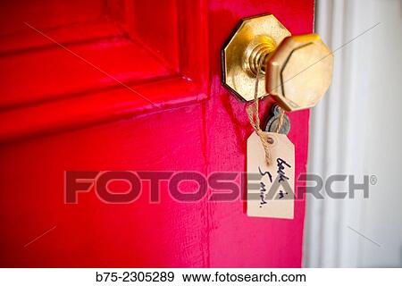 Brass doorknob in a red doorway of a business with a tag hanging that says: Back in 5 minutes. Pateley Bridge, North Yorkshire, England, UK View Large Photo Image Stock Photo - Brass doorknob in a red doorway of a business with a tag hanging that says: Back in 5 minutes. Pateley Bridge, North Yorkshire, England, UK. Fotosearch