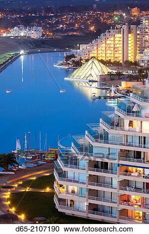 Chile, Algarrobo, San Alfonso del Mar, World's largest man-made pool, elevated view, dusk. View Large Photo Image Stock Image - Chile, Algarrobo, San Alfonso del Mar, World's largest man-made pool, elevated view, dusk.. Fotosearch