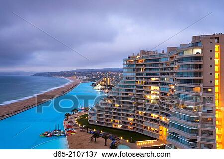 Stock Photo - Chile, Algarrobo, San Alfonso del Mar, World's largest man-made pool, elevated view, dusk.. Fotosearch