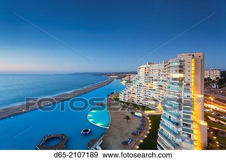 Stock Photo - Chile, Algarrobo, San Alfonso del Mar, World's largest man-made pool, elevated view, dusk.. Fotosearch