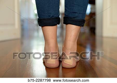 Closeup rear view of the foot of a teenager with some strips at the ankles View Large Photo Image Stock Photo - Closeup rear view of the foot of a teenager with some strips at the ankles. Fotosearch