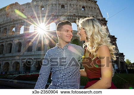 Couple at the Roman Colosseum in Rome Italy. View Large Photo Image Picture - Couple at the Roman Colosseum in Rome Italy.. Fotosearch