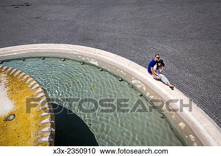 Stock Image - Couple in love. Piazza del Popolo. Rome Italy.. Fotosearch