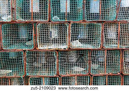 Stock Image - Cudillero, Asturias, Espana. Fishing creels. Nasa is a network of passive fishing, consisting of a cylindrical shape that tapers form of inverted funnel so that when the prey mainly crustaceans, shellfish and cephalopods enters the network. Fotosearch