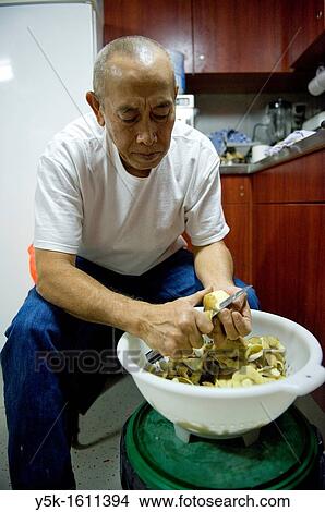 During the voyage of the MV Flintercape from Rotterdam, Netherlands to Sundsvall, Sweden, this Indonesian cook takes care of all the food and meals on board. View Large Photo Image Picture - During the voyage of the MV Flintercape from Rotterdam, Netherlands to Sundsvall, Sweden, this Indonesian cook takes care of all the food and meals on board.. Fotosearch