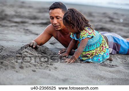 Father and daughter playing on the beach. View Large Photo Image Stock Photography - Father and daughter playing on the beach.. Fotosearch