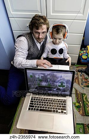 Father and son. View Large Photo Image Picture - Father and son.. Fotosearch