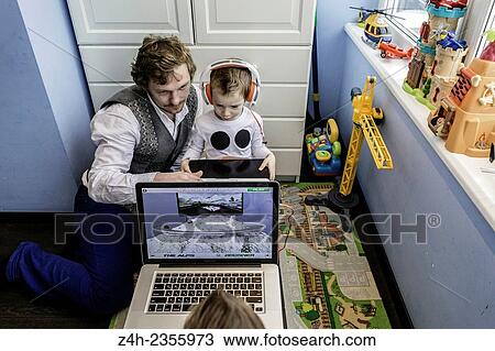 Stock Image - Father and son.. Fotosearch