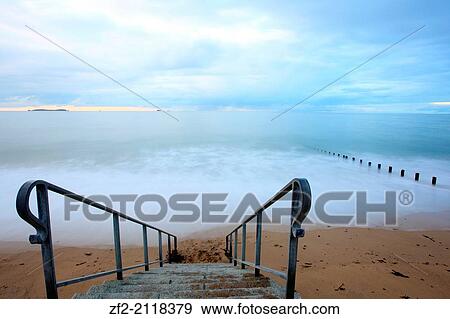 France, Brittany, Ille-et-Vilaine, Saint-Malo, long exposure on the breakwater. View Large Photo Image Stock Photo - France, Brittany, Ille-et-Vilaine, Saint-Malo, long exposure on the breakwater.. Fotosearch