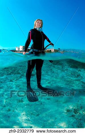 Freediver, night diving in the Red Sea, Egypt. View Large Photo Image Stock Photo - Freediver, night diving in the Red Sea, Egypt.. Fotosearch