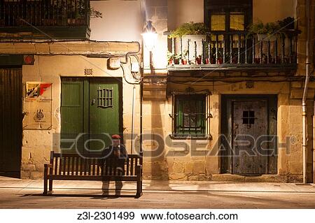 Stock Photo - Ghost boy captured in long exposure from the Plaza de Armas, Hondarribia, Guipuzcoa, Basque Country, Spain. Fotosearch