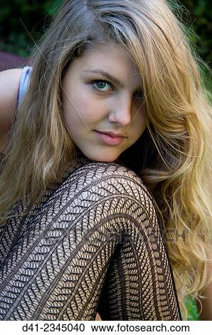 Girl teenager portrait chin on knee. View Large Photo Image Stock Image - Girl teenager portrait chin on knee.. Fotosearch